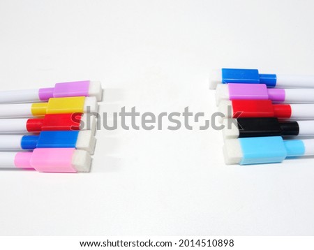 Colorful Markers Isolated on White Background. Copy Space of Felt Pens Arranged in Rows.