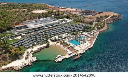 Aerial drone photo of famous 5 star luxury 4 seasons hotel and resort in iconic peninsula Vouliagmeni in south Athens riviera , Attica, Greece