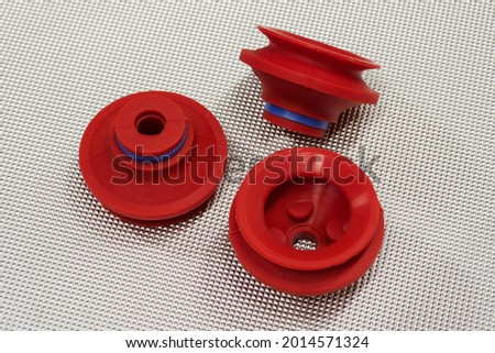 Red industrial vacuum machine suction cups. Royalty-Free Stock Photo #2014571324