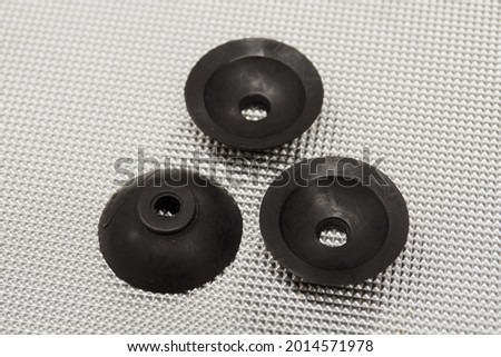 Black industrial vacuum machine suction cups. Royalty-Free Stock Photo #2014571978