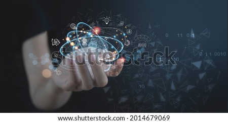 Internet of Things, IoT, global network technology, digital marketing, software development, big data, business intelligence concept. Woman hand with global network, technology icons on virtual screen Royalty-Free Stock Photo #2014679069