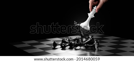 Businessman playing chess Plan of leading strategy successful business leader concept.business strategy,plan,fighting,change,management and leadership concept.