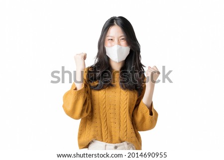 Young Asian woman wearing face mask to prevent infection corona virus in isolated on white background Royalty-Free Stock Photo #2014690955