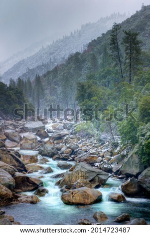 Yosemite River in Merced County California on misty spring day. Royalty-Free Stock Photo #2014723487