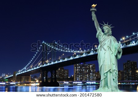 manhattan Bridge and The Statue of Liberty at Night, New York City