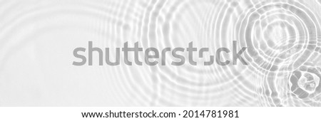 Water panoramic banner background. White water texture, aqua surface with rings and ripples Royalty-Free Stock Photo #2014781981