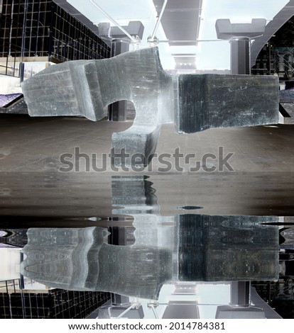 dystopian photo of Madrid on rising water levels due to climate change, Chillida Sculpture, The beached siren,  reflected in water, abstract photography, 