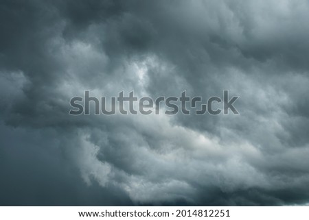 Close-up black strom clouds, Dark sky and dramatic storm clouds before rainy, Bad weather with precipitation in rainy season Royalty-Free Stock Photo #2014812251