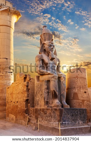 Statue of Seated Rameses II in Luxor Temple, Egypt Royalty-Free Stock Photo #2014837904