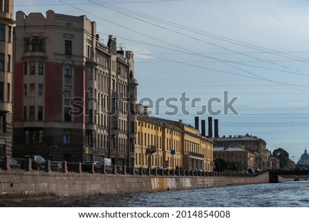 a vintage picture of old buildings and the river in Saint Petersburg