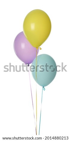 Colorful balloons with ribbons on white background