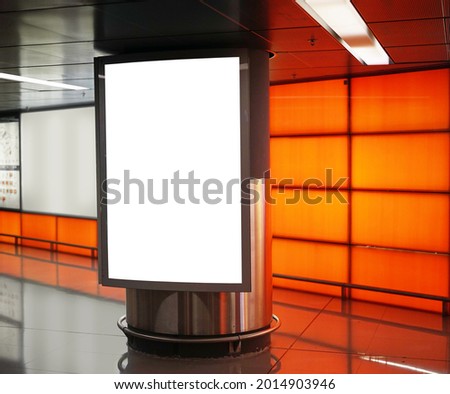 Large vertical poster in an advertising design for a metro station in an underpass                  