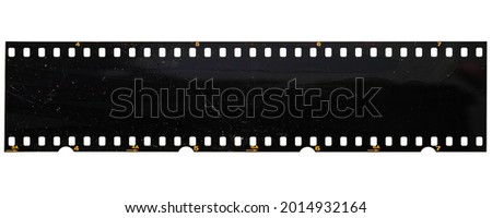 long and underexposed dia 35mm film strip isolated on white background. real positive film material.
