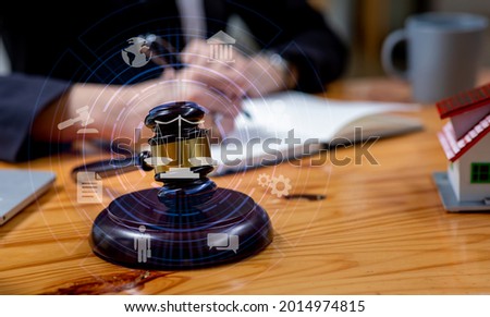 Close-up Of male lawyer working in office,Labor law, Lawyer, Attorney at law, Legal advice business concept on screen.	