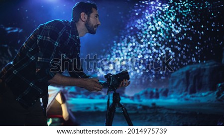 Photographer Prepares His Camera for Starry Night Sky, Astro Photography in the Desert Nightscape. Nature Loving Photo Shoot of Amazing Milky Way Starry Sky, Majestic Marvel of Rocky Canyon Nature