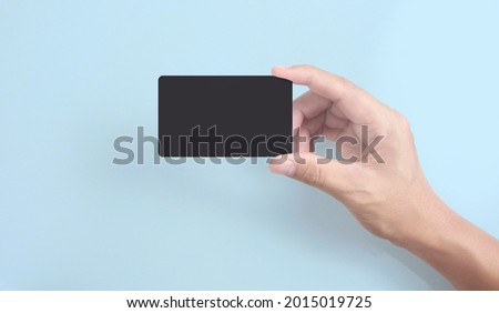 Hand holding virtual card showing with your