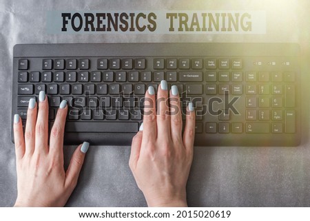 Text caption presenting Forensics Training. Business concept scientific methods and processes to solving crimes Lady Hands Pointing Pressing Computer Keyboard Keys Typewriting New Ideas.