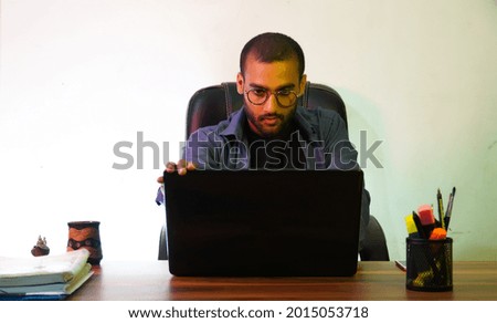 man with laptop using laptop
