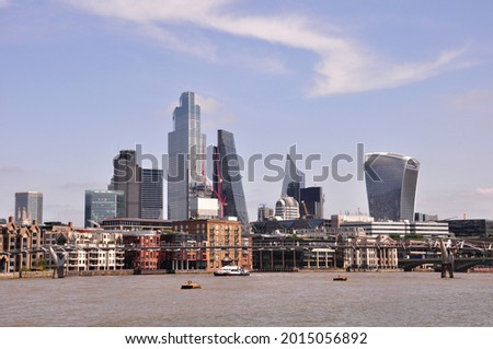 London, the UK - 07.23.2021 - skyscrapers of the City of London overlooking the Thames
