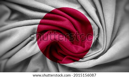 The national flag of Japan. Japan flag with fabric texture. Close up waving flag of Japan.