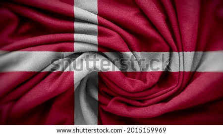 The national flag of Denmark. Denmark flag with fabric texture. Close up waving flag of Denmark.