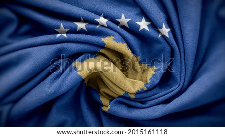 The national flag of Kosovo. Kosovo flag with fabric texture. Close up waving flag of Kosovo.
