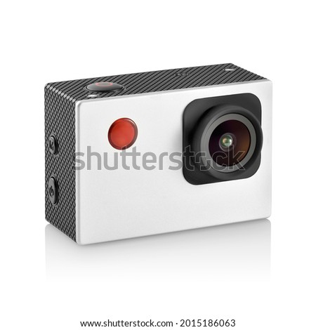 Three-quarter view of black and silver action camera on white background with reflection underneath