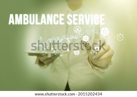 Sign displaying Ambulance Service. Business concept emergency response wing of the National Health Service Lady In Suit Holding Phone And Performing Futuristic Image Presentation.