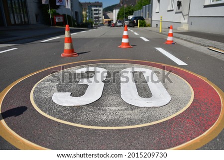 Painting of a floor marking for a 30 km  h restriction in Freistadt, Upper Austria, Austria, Europe