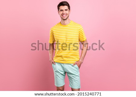 Photo of charming young happy man hold hands pockets good mood smile isolated on pink color background Royalty-Free Stock Photo #2015240771
