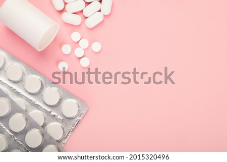 Assortment of different pills and medical bottles. Concept of illness and treatment. Medicine and healthcare. Top view, Copy space, flat lay