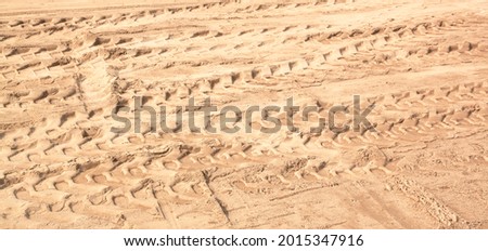 Tractor wheel tracks Texture background