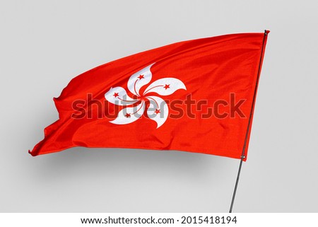 Hong Kong flag isolated on white background. National symbol of Hong Kong. Close up waving flag with clipping path.