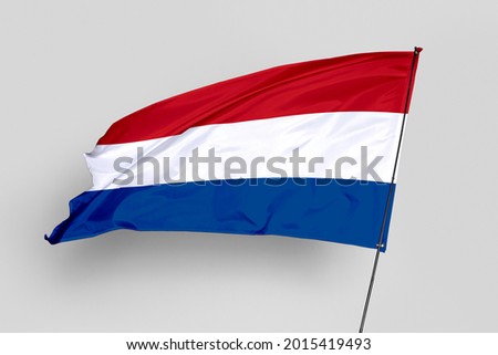 Netherlands flag isolated on white background. National symbol of Netherlands. Close up waving flag with clipping path.
