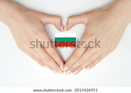 Women's hands create a heart inside the flag of Bulgaria on a white background.Background for postcards, articles for Flag Day, Independence Day,Unification Day of Bulgaria,travel,patriotism,tradition Royalty-Free Stock Photo #2015426951