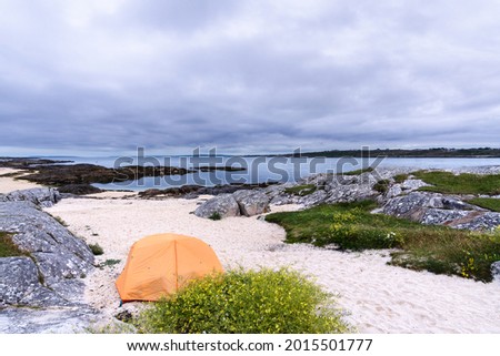 picture of a tent in free camp on coral strand beach Galway