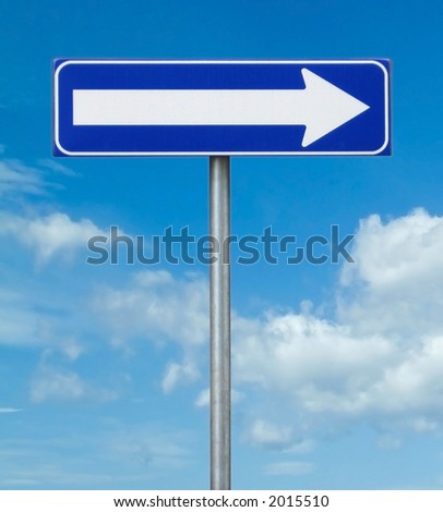 street sign over blue sky