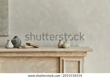 Stylish minimalistic monochromatic composition with design vases and personal accessories. Poster on the wall. Copy space. Neutral colors. Template. 