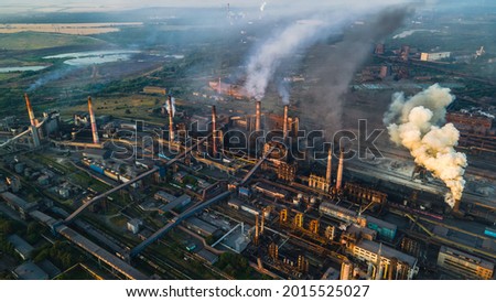 metallurgical plant heavy industry poor ecology top view smoke from chimneys smog Royalty-Free Stock Photo #2015525027