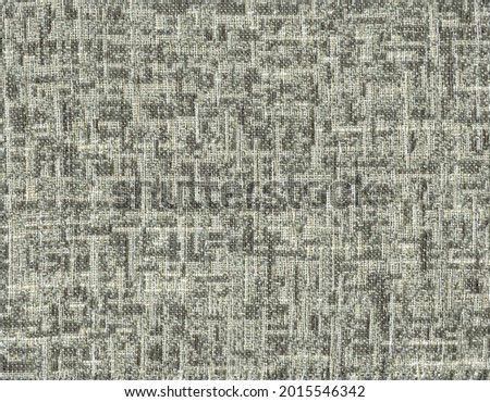 Close-up of the grey textile texture, background and wallpaper. The texture of grey fabric textile upholstery of furniture. 