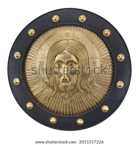 Gold icon with the face of Christ in a black frame. Russian inscription means in English "Jesus Christ, alpha and omega". Design element with clipping path