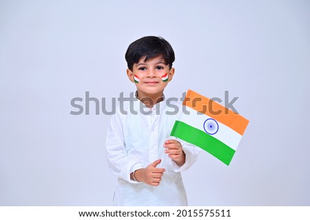 Little boy holding tricolor  flag on the occasion of Vijay Diwas Royalty-Free Stock Photo #2015575511