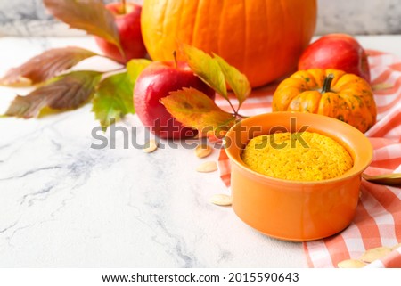 Tasty pumpkin pudding on table