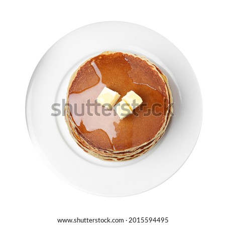 Stack of tasty pancakes with butter and honey on white background, top view Royalty-Free Stock Photo #2015594495