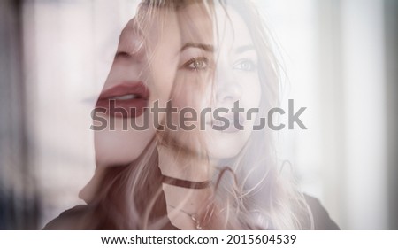 Double exposure of young woman. Abstract portrait.