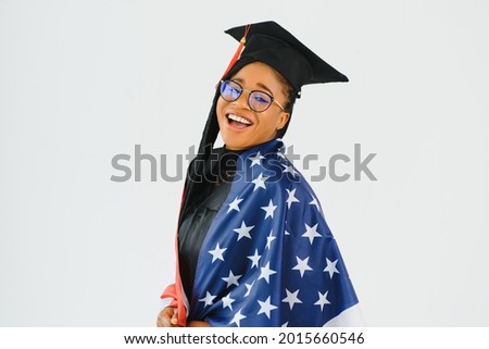 Happy female student with USA flag background. Studying in USA conceptual