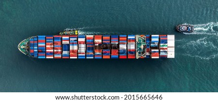 tug ship drag container cargo smart ship vessel to cargo international container yard port concept shipping by sea.