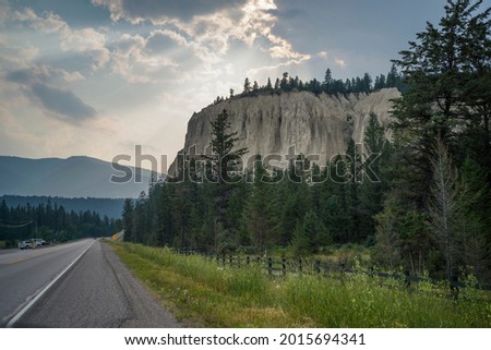 Road passing through countryside, East Kootenay, British Columbia, Canada Royalty-Free Stock Photo #2015694341