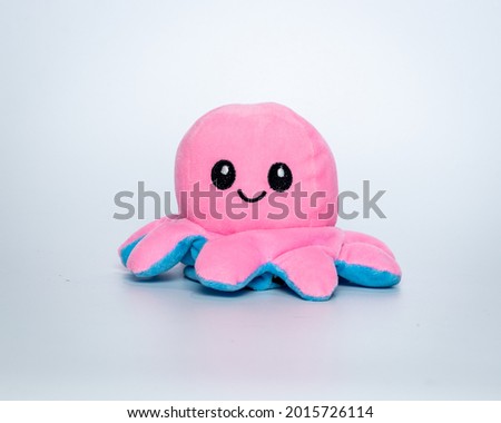 Octopus Reversible Mood Toy - Pink Color Happy Side Royalty-Free Stock Photo #2015726114