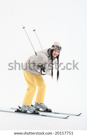Young Ski Woman in Winter